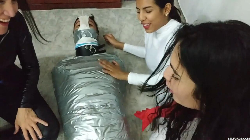 Latino Hunk Heavily Mummified by Cooperative Femdom Women