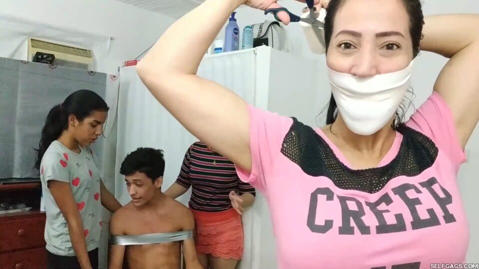 Chair Bound And Tickled By Three Microfoamly Tape Gagged Girls! — gallery-3